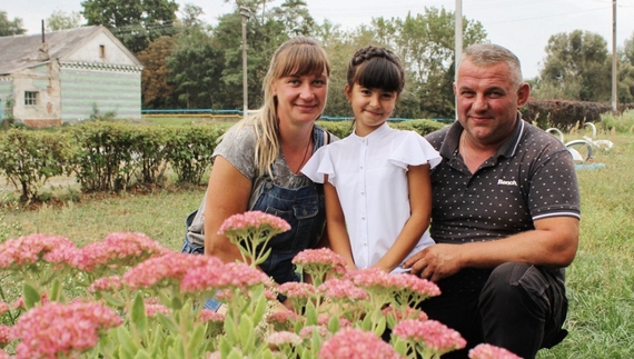 Марина та Віктор Мисники з донькою Олею