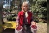 Галина Зозуль з відрами кизилу