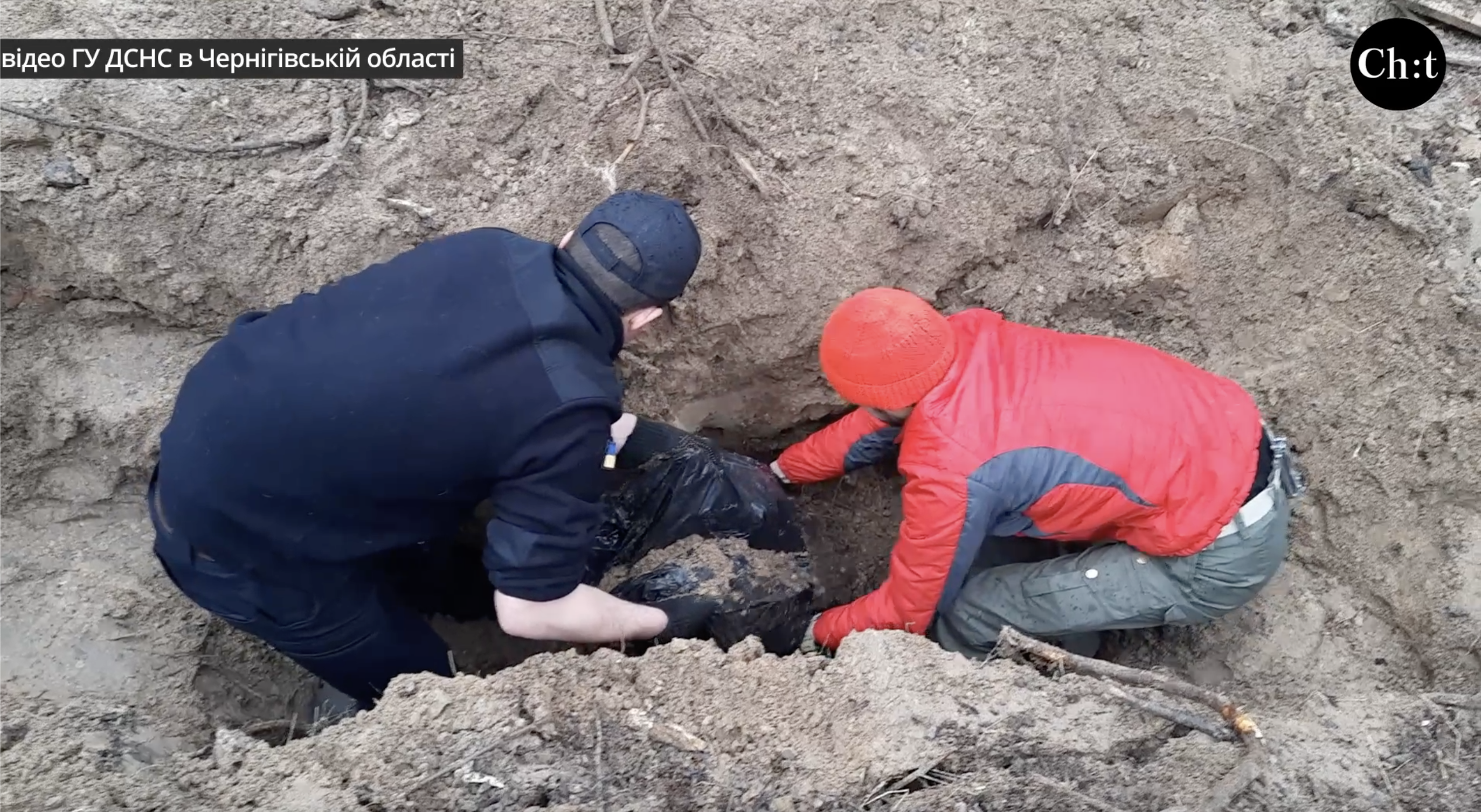 Ексгумація могил людей, який вбили росіяни